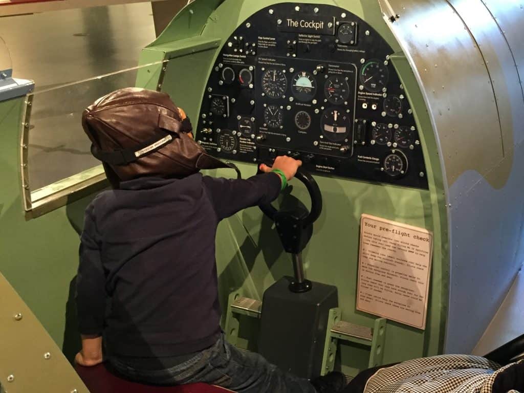 Boy pilot in Spitfire cockpit Thinktank Birmingham